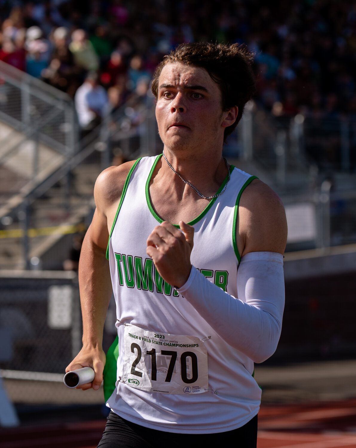 Tumwater’s Christian Schlecht runs the third leg of the 4x400 relay at the WIAA 2A/3A/4A State Track and Field Championships on Saturday, May 27, 2023, at Mount Tahoma High School in Tacoma. (Joshua Hart/For The Chronicle)